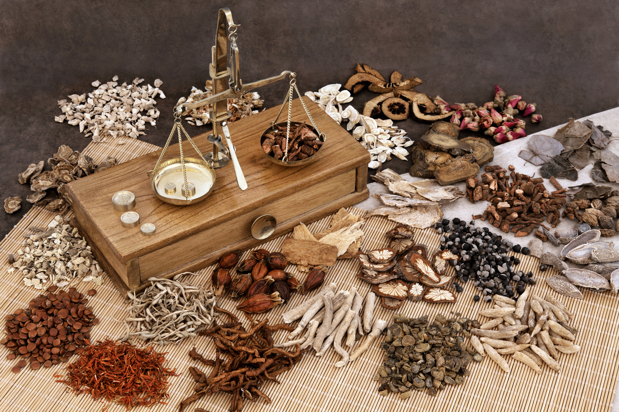chinese herbs Traditional chinese herbal medicine selection with herb ingredients and old scales.