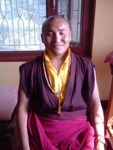 Buddhist monk with acupuncture needles